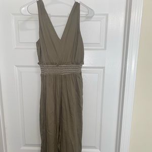 Green jumpsuit. Never worn with tags.
